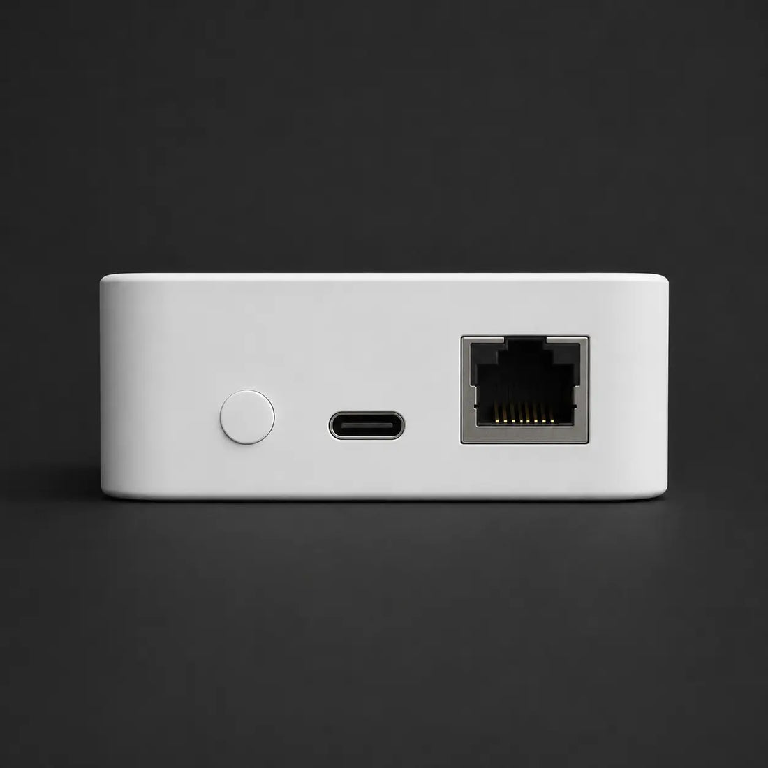 vploq Home rear panel with USB-C power and Ethernet port